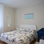 Faro Dell'estate Delizioso Bicamera Con Posto Auto Dietro La Apartment Grado
